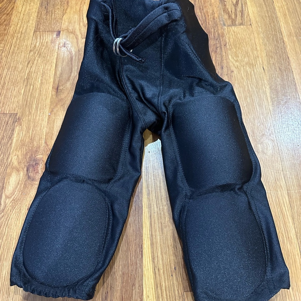RIDDELL FOOTBALL PANTS.